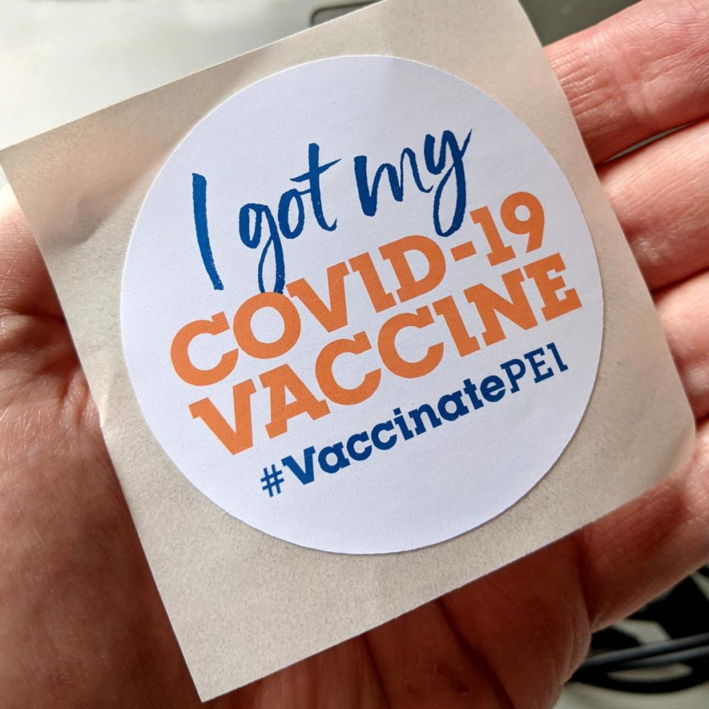 Sticker that says "I got my COVID-19 Vaccine #VaccinatePEI