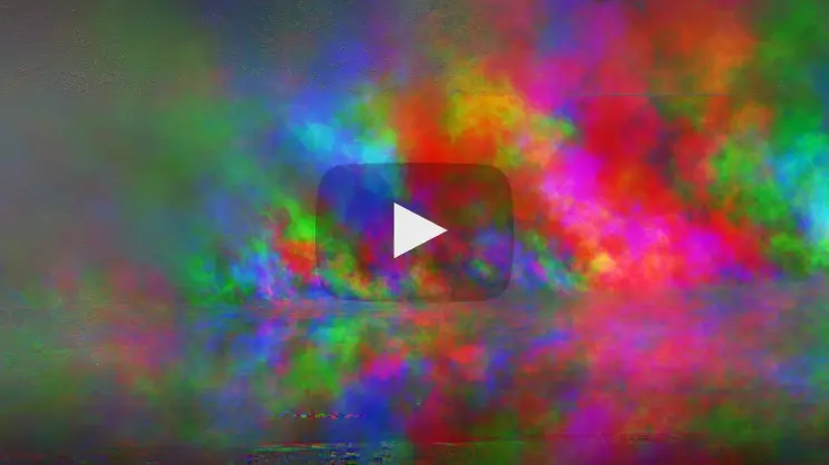Thumbnail image from video showing clouds of mixes of bright colors and a YouTube style play button in the middle