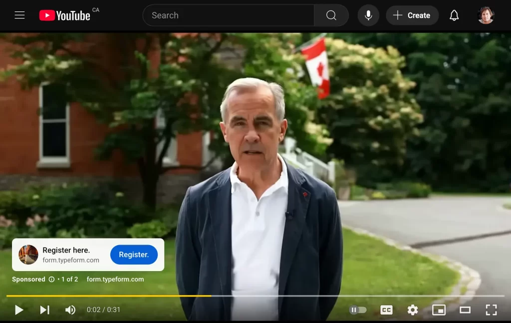 YouTube screenshot showing an advertisement with an AI-generated Mark Carney standing outdoors with a Canadian flag in the background and a prompt button to Register here.